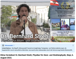 Bernhard Strehl am 6.8.23 in Steyr (Screenshot mit von YouTube hinzugefügter Defintion von "Klimawandel")