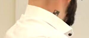 Deniz C.: Überstochenes Hakenkreuz-Tattoo